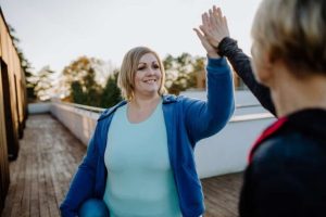 CHW Giving High Five